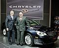 Tom LaSorda and Joe Eberhardt reveal the all-new Chrysler Sebring sedan at the 2006 British International Motor Show.